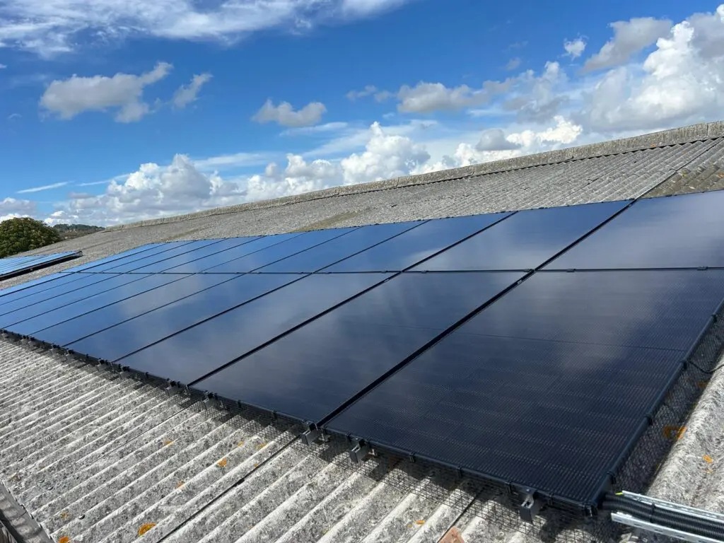 solar panels installed on a fibre cement roof in a farm
